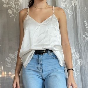 White satin cami with pearl/gold straps